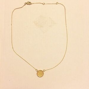 Charming Charlie necklace with yellow beaded disc
